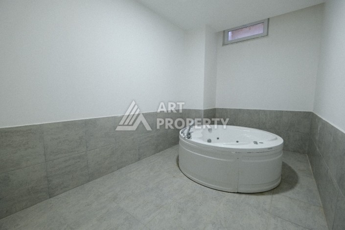 Квартира 1+1  с площадью 60 кв.м всего в 300 метрах в популярном районе Махмутлар - Ракурс 10