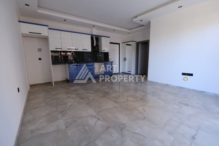 Квартира 1+1  с площадью 60 кв.м всего в 300 метрах в популярном районе Махмутлар - Ракурс 15