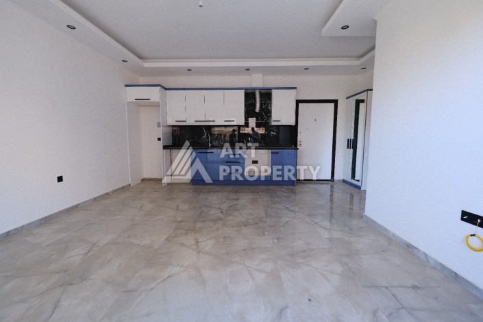 Квартира 1+1  с площадью 60 кв.м всего в 300 метрах в популярном районе Махмутлар - Ракурс 16