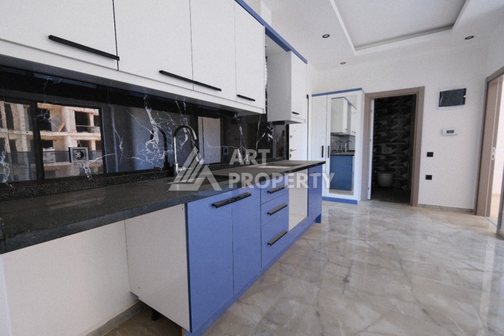 Квартира 1+1  с площадью 60 кв.м всего в 300 метрах в популярном районе Махмутлар - Ракурс 17