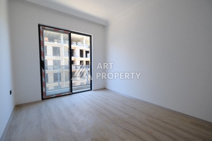 Квартира 1+1  с площадью 60 кв.м всего в 300 метрах в популярном районе Махмутлар - Ракурс 25