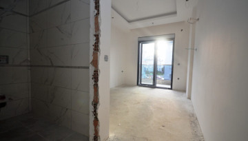 Трехкомнатная квартира с отдельной кухней в новом комплексе в районе Оба, 100 м2 - Ракурс 14