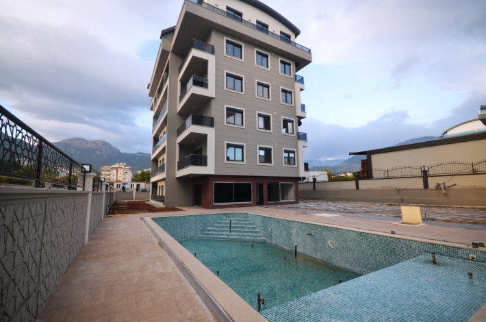 Трехкомнатная квартира с отдельной кухней в новом комплексе в районе Оба, 100 м2 - Ракурс 25