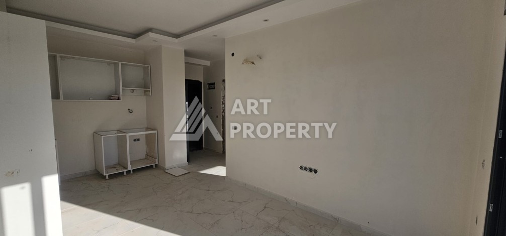 Бюджетная квартира 1+1 в новом ЖК, 54 кв.м. в Махмутларе. - Ракурс 2