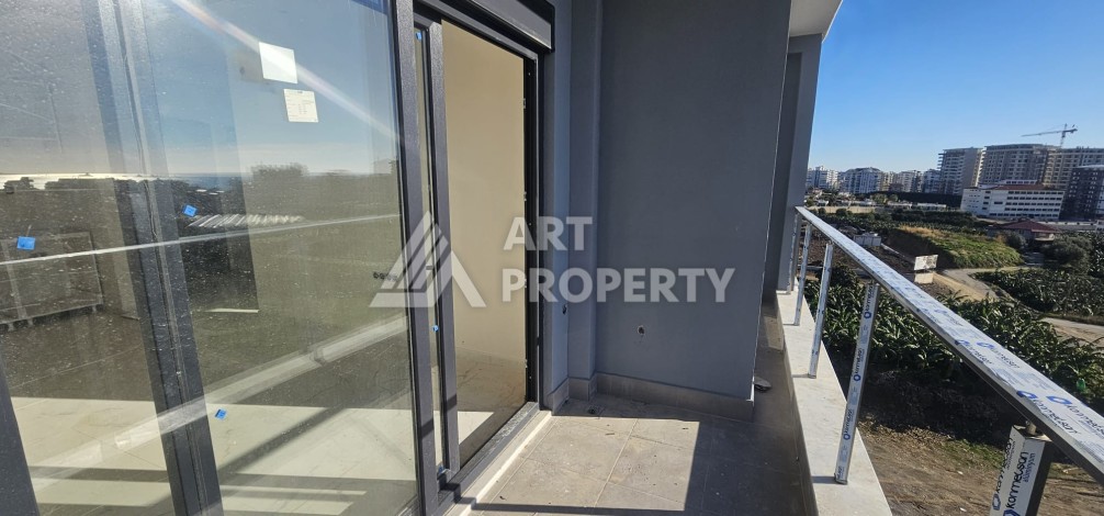 Бюджетная квартира 1+1 в новом ЖК, 54 кв.м. в Махмутларе. - Ракурс 7