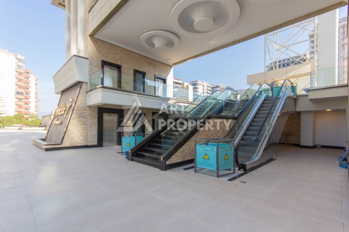 Квартира 1+1 в премиум комплексе в Махмутларе, 70 кв.м. - Ракурс 20