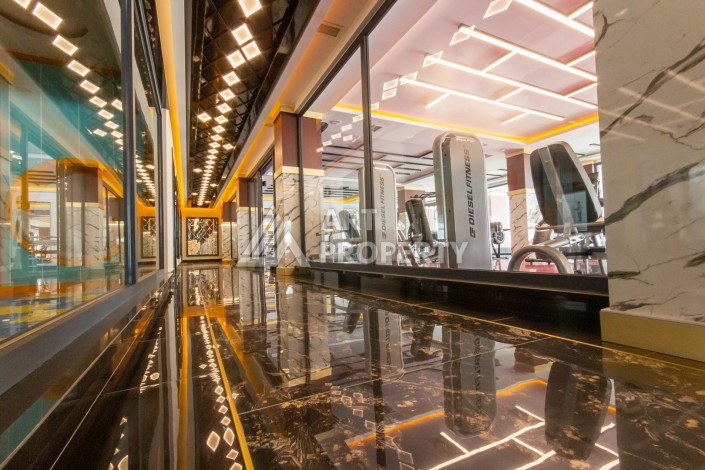 Квартира 1+1 в премиум комплексе в Махмутларе, 70 кв.м. - Ракурс 32