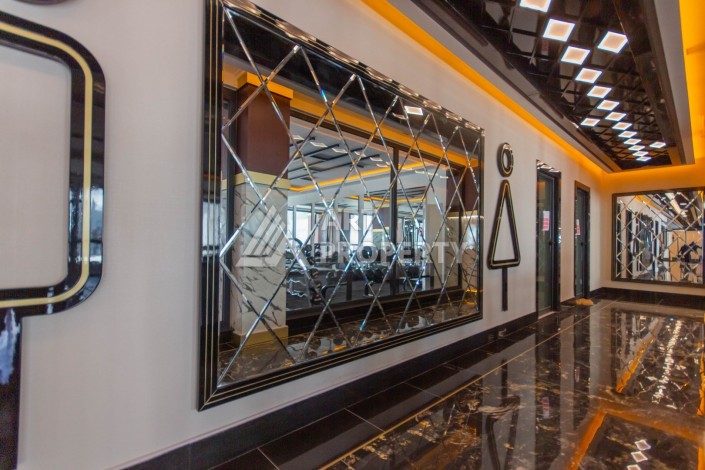 Квартира 1+1 в премиум комплексе в Махмутларе, 70 кв.м. - Ракурс 33