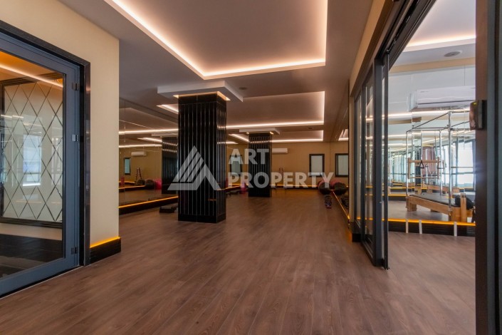 Квартира 1+1 в премиум комплексе в Махмутларе, 70 кв.м. - Ракурс 34