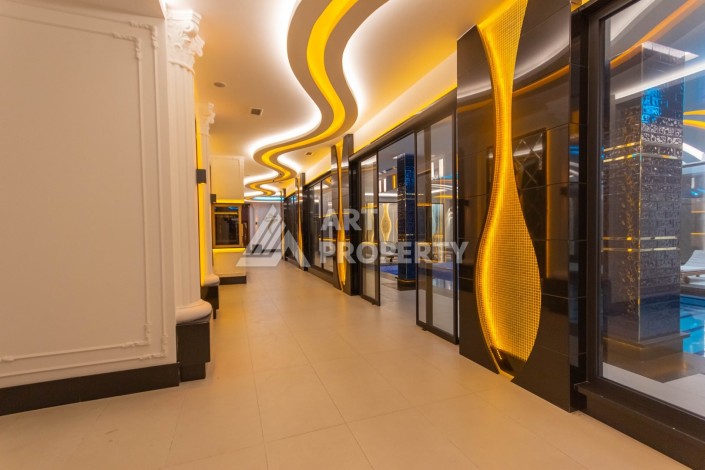 Квартира 1+1 в премиум комплексе в Махмутларе, 70 кв.м. - Ракурс 41