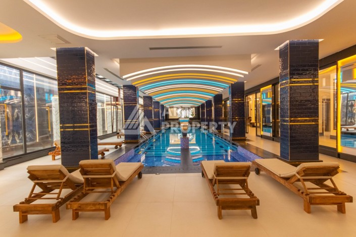 Квартира 1+1 в премиум комплексе в Махмутларе, 70 кв.м. - Ракурс 42