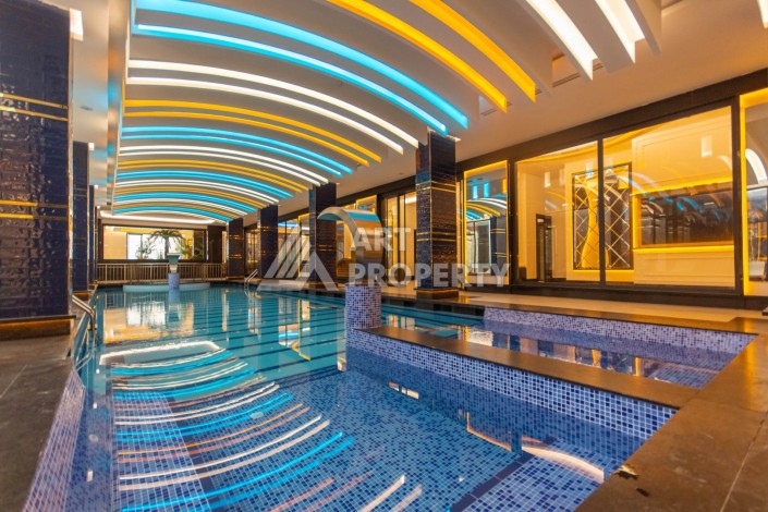 Квартира 1+1 в премиум комплексе в Махмутларе, 70 кв.м. - Ракурс 43