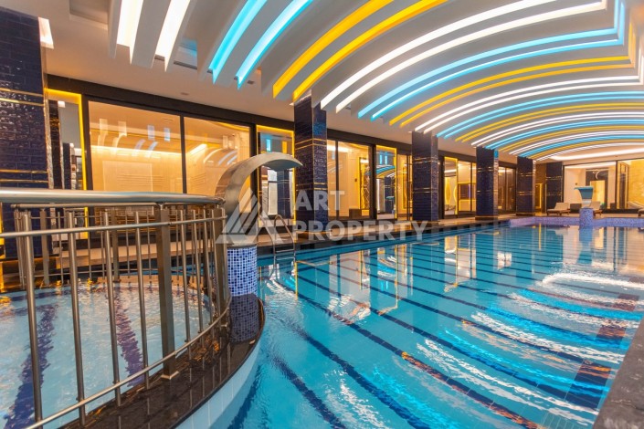 Квартира 1+1 в премиум комплексе в Махмутларе, 70 кв.м. - Ракурс 44