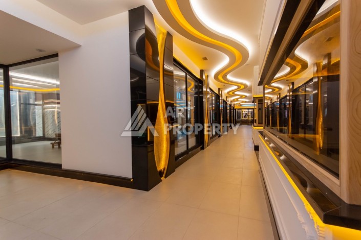 Квартира 1+1 в премиум комплексе в Махмутларе, 70 кв.м. - Ракурс 53