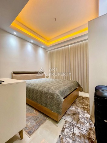 Квартира 1+1 в премиум комплексе в Махмутларе, 70 кв.м. - Ракурс 65