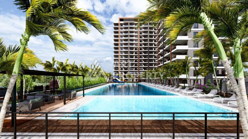 Просторные квартиры 1+1 и 2+1 в новой резиденции. Арпачбахшиш, Мерсин - Ракурс 5