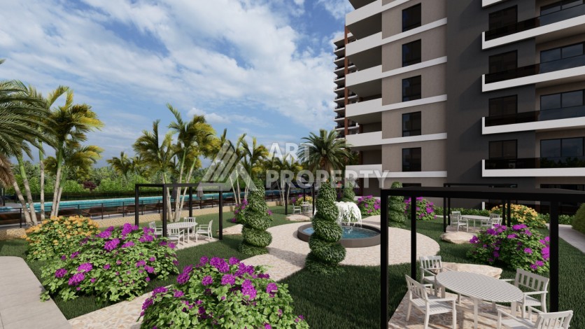 Просторные квартиры 1+1 и 2+1 в новой резиденции. Арпачбахшиш, Мерсин - Ракурс 7