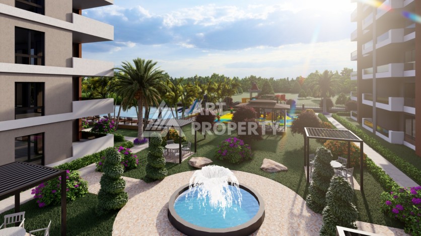 Просторные квартиры 1+1 и 2+1 в новой резиденции. Арпачбахшиш, Мерсин - Ракурс 8