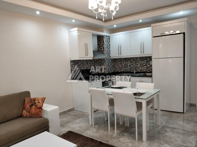 Меблированная квартира 1+1 всего в 300 метрах от моря. Обагёль, Алания. - Ракурс 3