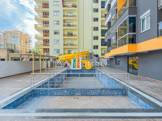 Квартира 2+1 с видом на море и крепость, 72 м2 в Махмутларе - Ракурс 2