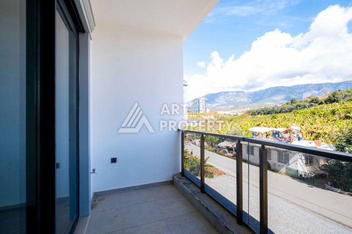 Квартира 1+1 с видом на природу, 52 кв.м. Махмутлар, Алания. - Ракурс 7