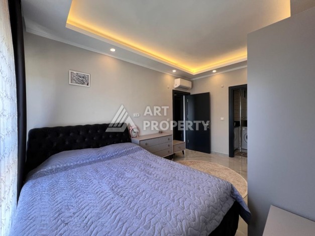 Меблированная квартира 2+1 с видом на море в Авсалларе, 90 кв.м. - Ракурс 12