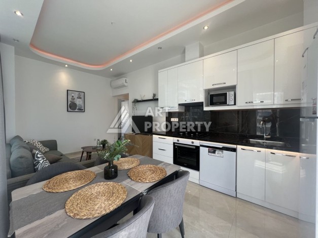 Просторная, меблированная, двухкомнатная квартира 1+1, 65м2, в 500 м от моря, Махмутлар, Алания - Ракурс 17