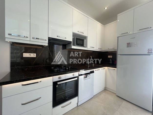 Просторная, меблированная, двухкомнатная квартира 1+1, 65м2, в 500 м от моря, Махмутлар, Алания - Ракурс 18