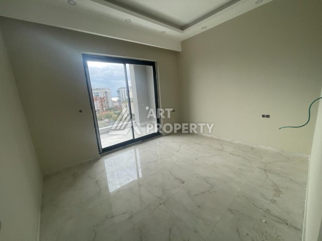 Просторные аппартаменты 1+1, 65 м2, всего в 300 м от моря, Тосмур, Алания - Ракурс 7