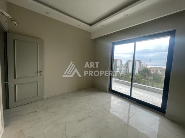 Просторные аппартаменты 1+1, 65 м2, всего в 300 м от моря, Тосмур, Алания - Ракурс 9