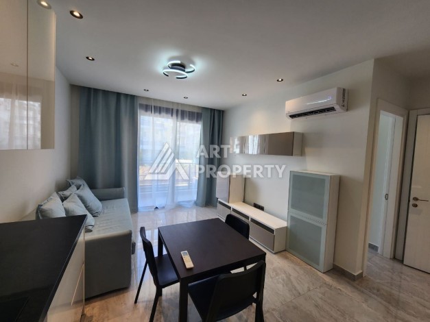 Квартира 1+1 в элитном комплексе, 56 кв.м. Оба, Алания - Ракурс 4