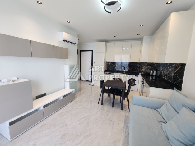 Квартира 1+1 в элитном комплексе, 56 кв.м. Оба, Алания - Ракурс 8