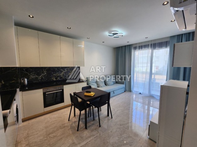 Квартира 1+1 в элитном комплексе, 56 кв.м. Оба, Алания - Ракурс 9