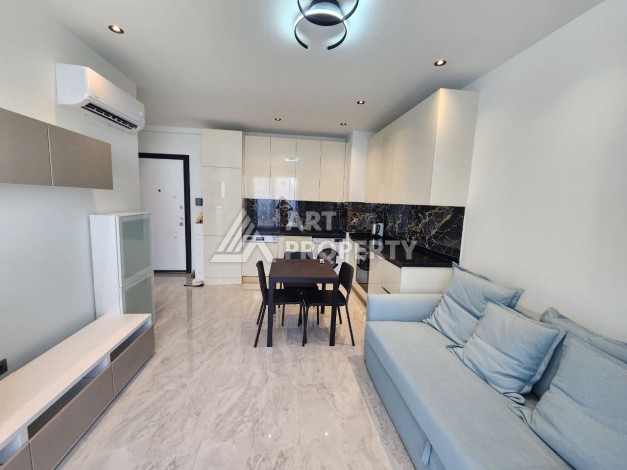 Квартира 1+1 в элитном комплексе, 56 кв.м. Оба, Алания - Ракурс 10