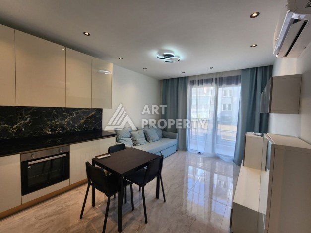 Квартира 1+1 в элитном комплексе, 56 кв.м. Оба, Алания - Ракурс 11