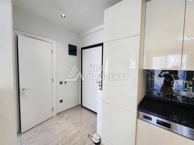 Квартира 1+1 в элитном комплексе, 56 кв.м. Оба, Алания - Ракурс 12