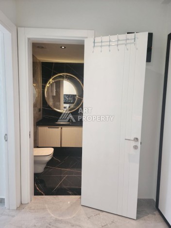 Квартира 1+1 в элитном комплексе, 56 кв.м. Оба, Алания - Ракурс 13