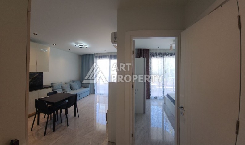 Квартира 1+1 в элитном комплексе, 56 кв.м. Оба, Алания - Ракурс 14