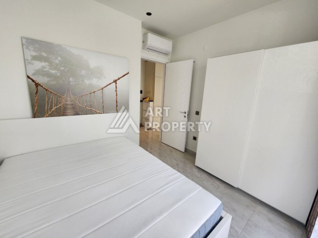 Квартира 1+1 в элитном комплексе, 56 кв.м. Оба, Алания - Ракурс 17