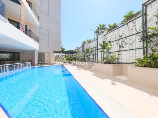 Квартира 1+1 в элитном комплексе, 56 кв.м. Оба, Алания - Ракурс 21