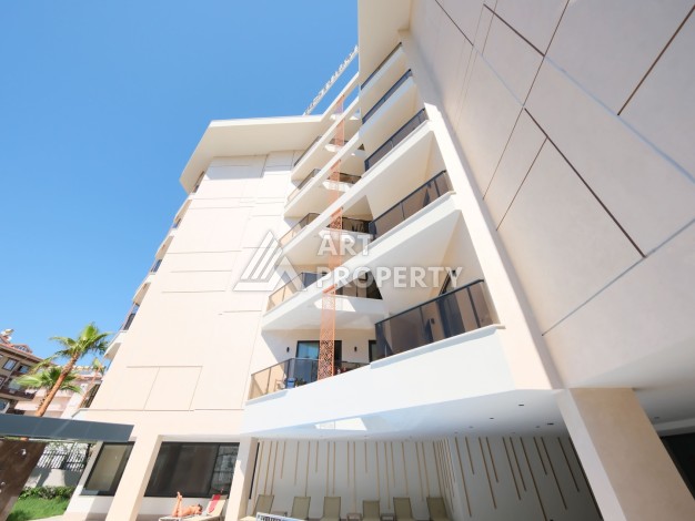 Квартира 1+1 в элитном комплексе, 56 кв.м. Оба, Алания - Ракурс 25