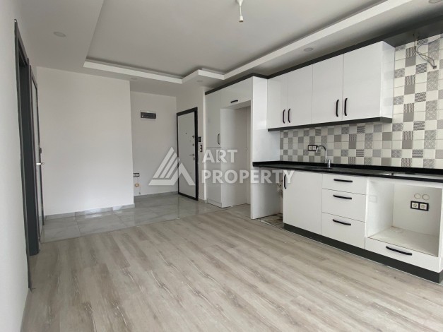 Квартира 1+1 с видом на горы в Махмутларе, 55 кв.м. - Ракурс 7