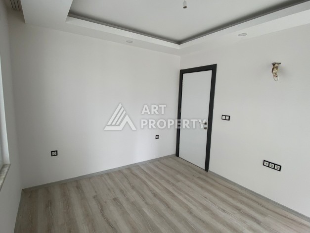 Квартира 1+1 с видом на горы в Махмутларе, 55 кв.м. - Ракурс 12