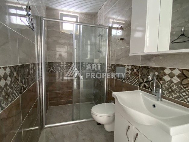 Квартира 1+1 с видом на горы в Махмутларе, 55 кв.м. - Ракурс 14