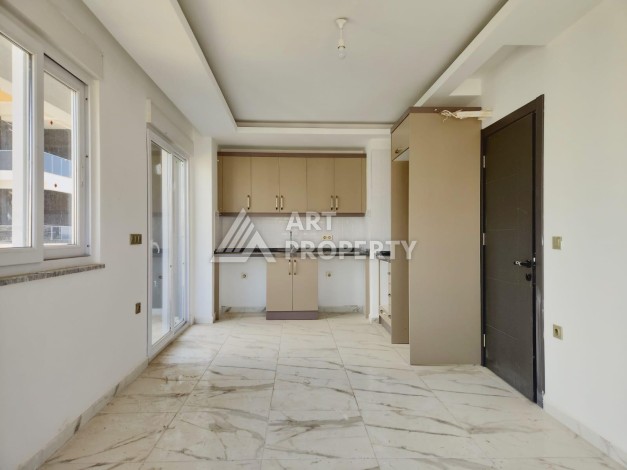 Квартира 2+1 с видом на море и крепость, 72 м2 в Махмутларе - Ракурс 18