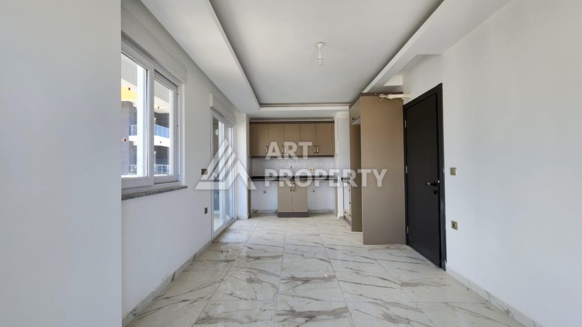 Квартира 2+1 с видом на море и крепость, 72 м2 в Махмутларе - Ракурс 20