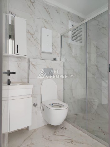 Квартира 2+1 с видом на море и крепость, 72 м2 в Махмутларе - Ракурс 22