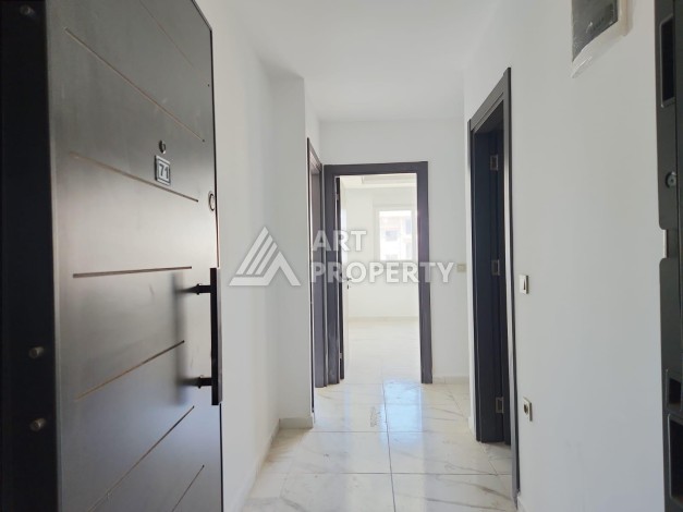 Квартира 2+1 с видом на море и крепость, 72 м2 в Махмутларе - Ракурс 25