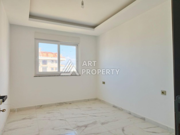 Квартира 2+1 с видом на море и крепость, 72 м2 в Махмутларе - Ракурс 28