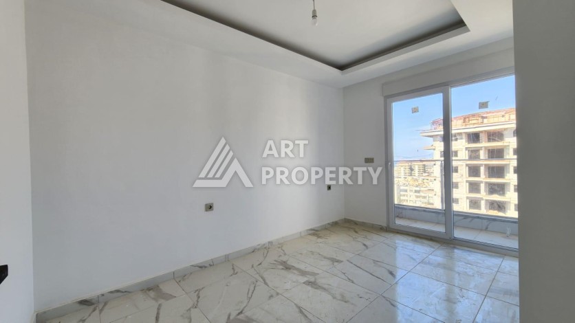 Квартира 2+1 с видом на море и крепость, 72 м2 в Махмутларе - Ракурс 31